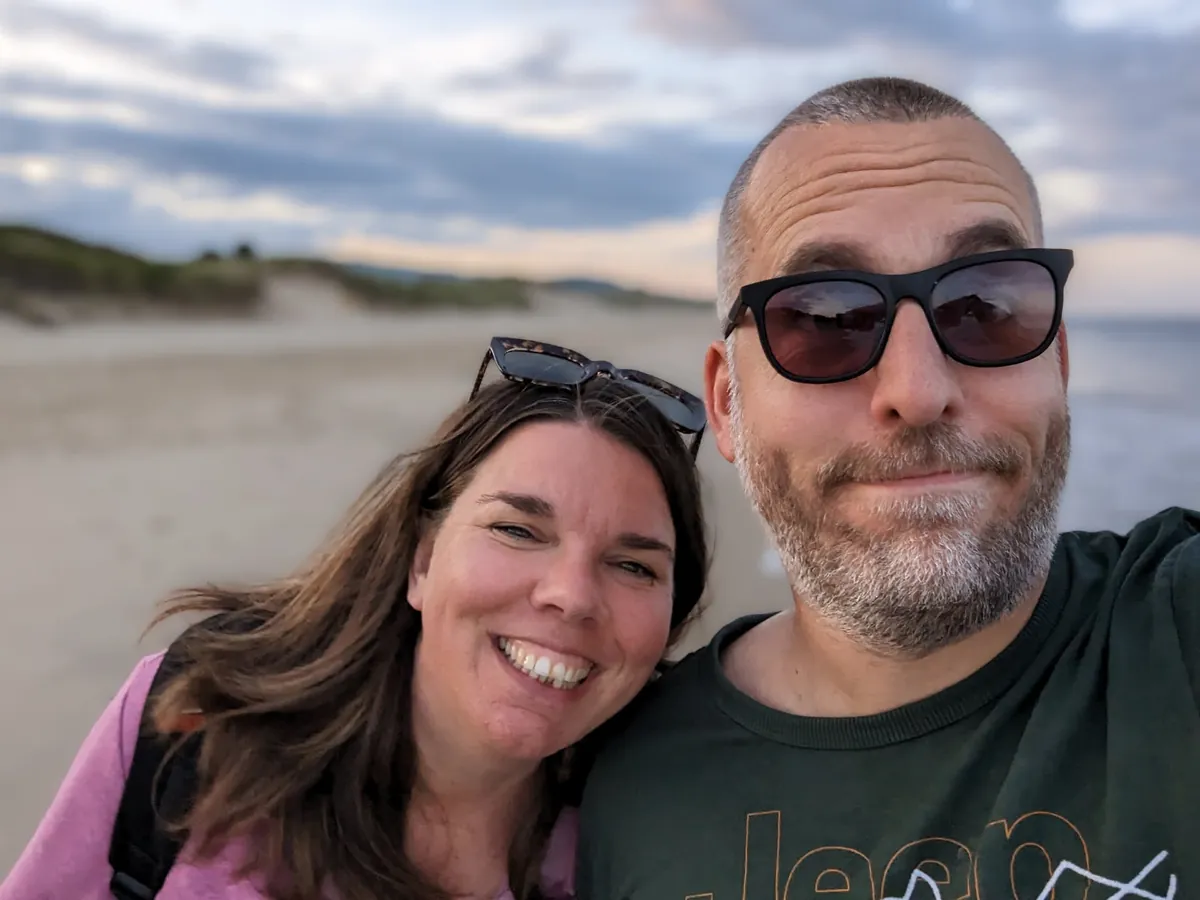Cat and Remco, the people behind boreen, on a beach in the evening